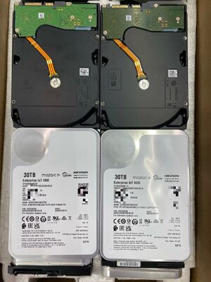 Les disques durs EXOS 28TB du groupe Seagate Exos Enterprise, numéro de modèle ST30000NM011F
